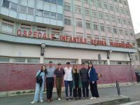 Fellows with University of Torino faculty, Dr. Liliana Vagliano, partners and team in front of the Ospedale Regina Margherita in Torino, Italy.